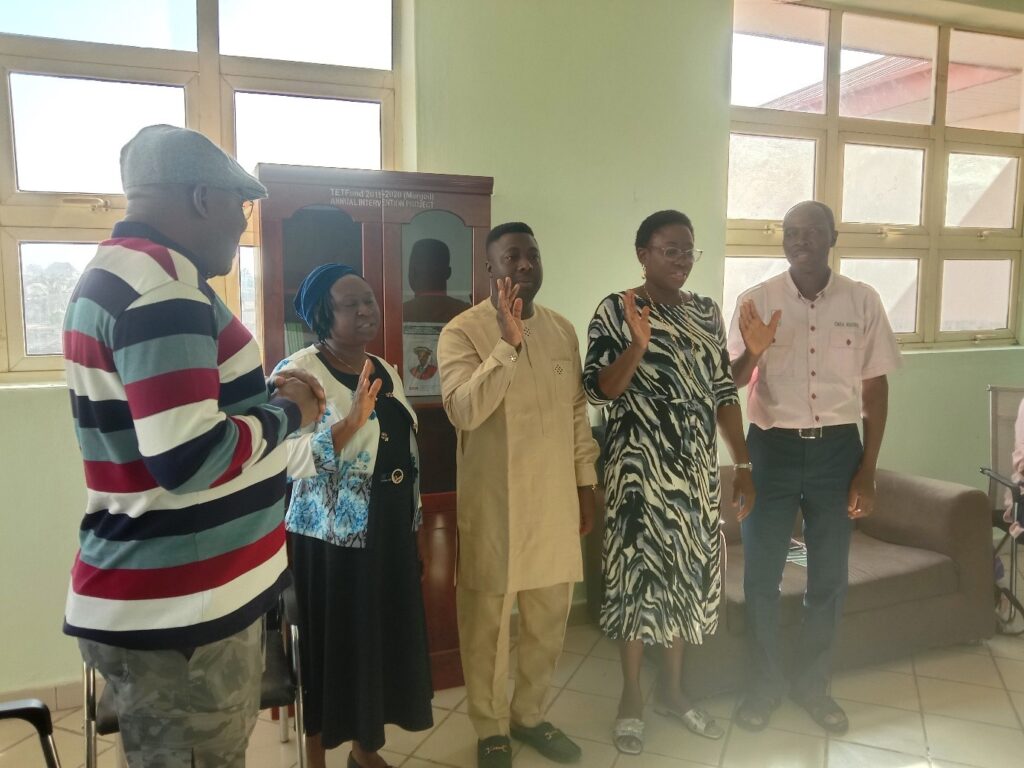 Prof. M. B. Sufiyan administering the oath of office to the newly elected EXCO of APHPN Kogi State Branch